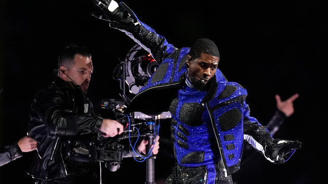 Usher performs during halftime of the NFL Super Bowl 58 football game between the San Francisco 49ers and the Kansas City Chiefs on Sunday, Feb. 11, 2024, in Las Vegas. (AP Photo/George Walker IV)