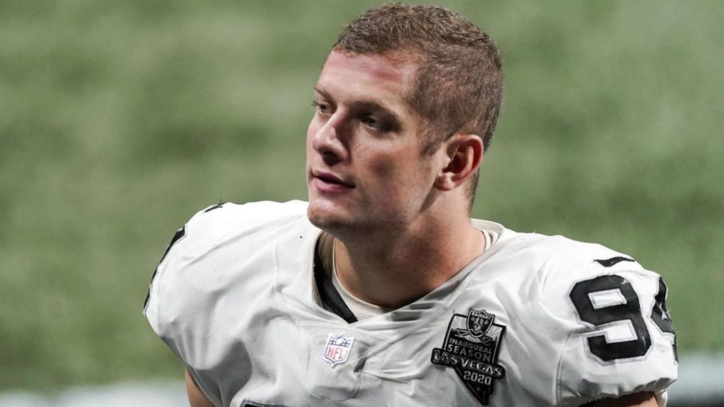 {p}FILE - In this Nov. 29, 2020, file photo, Las Vegas Raiders defensive end Carl Nassib leaves the field after an NFL football game against the Atlanta Falcons in Atlanta. (AP Photo/John Bazemore, File){/p}