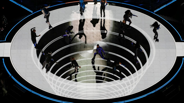 Usher, center, performs during halftime of the NFL Super Bowl 58 football game between the San Francisco 49ers and the Kansas City Chiefs Sunday, Feb. 11, 2024, in Las Vegas. (AP Photo/David J. Phillip)