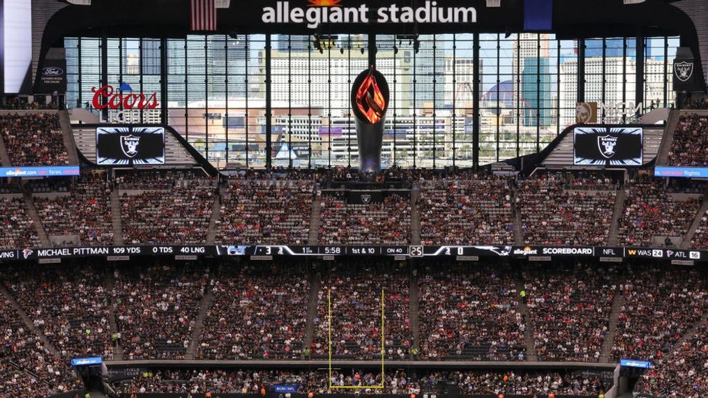 LAS VEGAS, NEVADA - OCTOBER 15: A general view shows the Las Vegas Strip outside the lanai doors at Allegiant Stadium behind the Al Davis Memorial Torch during the first quarter of a game between the New England Patriots and the Las Vegas Raiders on October 15, 2023 in Las Vegas, Nevada. The Raiders defeated the Patriots 21-17. (Photo by Ethan Miller/Getty Images)