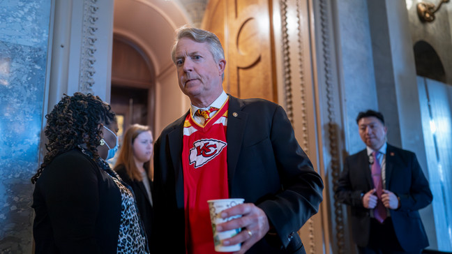 Sen. Roger Marshall, R-Kan., arrives as the Senate prepares a procedural vote on an emergency spending package that would provide military aid to Ukraine and Israel, replenish U.S. weapons systems and provide food, water and other humanitarian aid to civilians in Gaza, at the Capitol in Washington, Sunday, Feb. 11, 2024. (AP Photo/J. Scott Applewhite)