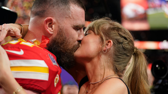 Taylor Swift kisses Kansas City Chiefs tight end Travis Kelce after the NFL Super Bowl 58 football game against the San Francisco 49ers, Sunday, Feb. 11, 2024, in Las Vegas. The Chiefs won 25-22 against the 49ers. (AP Photo/Brynn Anderson)