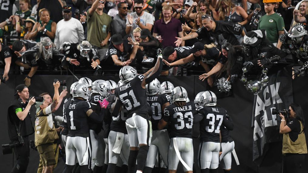 LAS VEGAS, NEVADA - OCTOBER 09: Robert Spillane #41 of the Las Vegas Raiders celebrates with teammates and fans after intercepting the ball during the second quarter against the Green Bay Packers at Allegiant Stadium on October 09, 2023 in Las Vegas, Nevada. (Photo by Candice Ward/Getty Images)