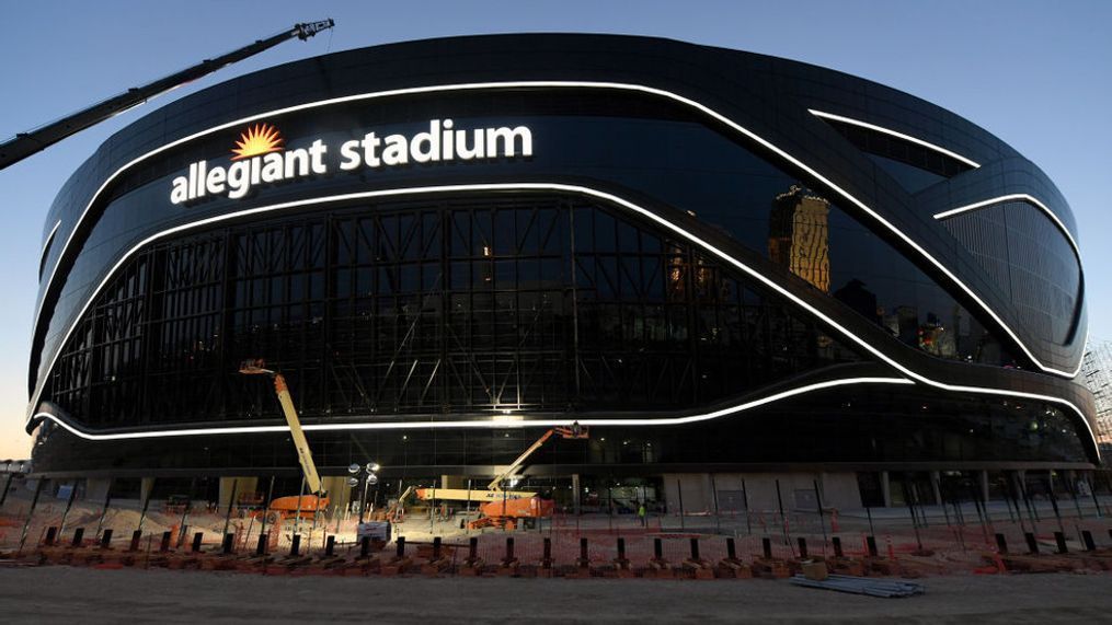 LAS VEGAS, NEVADA - APRIL 23:  Crews test out architectural light ribbons and exterior sign lighting as construction continues at Allegiant Stadium, the USD 2 billion, glass-domed future home of the Las Vegas Raiders on April 23, 2020 in Las Vegas, Nevada. The Raiders and the UNLV Rebels football teams are scheduled to begin play at the 65,000-seat facility in their 2020 seasons.  (Photo by Ethan Miller/Getty Images)